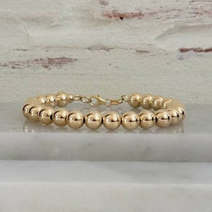 8mm 14k GF seamless round ball beaded clasp bracelet. Choose your size. Made to order. Customizable.