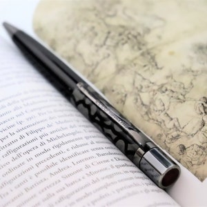 REDÓ FLORENCE 1989 - Ballpoint pen "Ebenum Oval", precious resin with 24Kt ruthenium plated bronze elements and enamels.Handmade in Florence