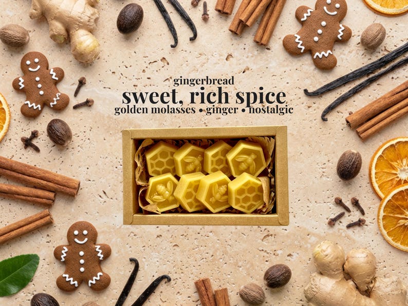 May include: A rectangular cardboard box containing eight yellow hexagonal wax melts with bee and honeycomb patterns. The text reads: gingerbread, sweet, rich spice, golden molasses, ginger, nostalgic. Surrounded by gingerbread cookies, cinnamon sticks, and spices.