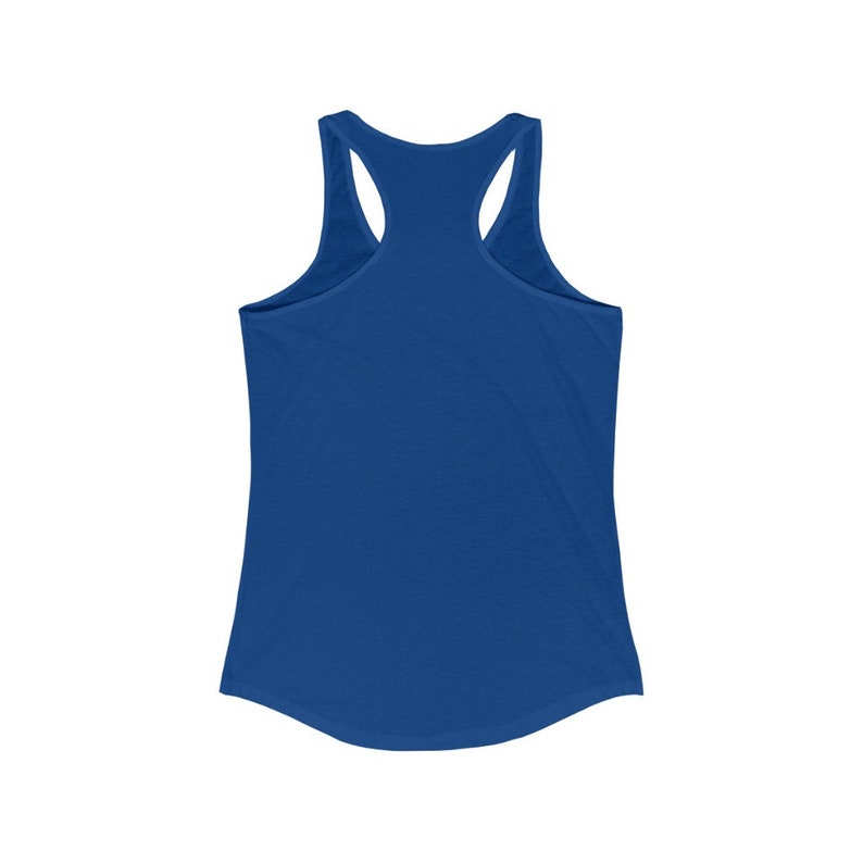 May include: A royal blue racerback tank top. The sleeveless top features a scoop neck and a curved hemline. The back has a racerback design with thin straps that meet at the upper back. The fabric appears soft and lightweight.