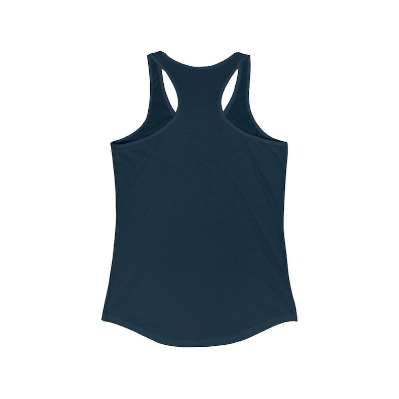 May include: A navy blue racerback tank top. The tank top has a scoop neck and a racerback design. The fabric appears to be a soft, lightweight material. The tank top is a solid color and has a curved hemline.