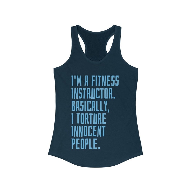 May include: Navy blue racerback tank top with the text "I'M A FITNESS INSTRUCTOR. BASICALLY, I TORTURE INNOCENT PEOPLE." in light blue. The tank top has a scoop neck and is made of a soft material.