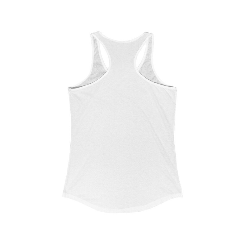 May include: A white racerback tank top with a scoop neck and a curved hemline. The tank top has a classic, athletic design with thin straps and a comfortable fit. The back features a racerback style, perfect for layering or wearing on its own.