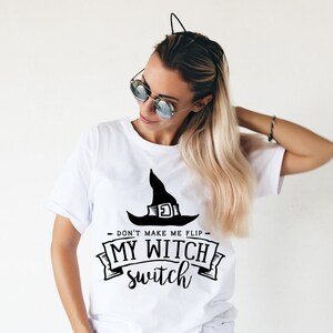 May include: White t-shirt with a black witch hat graphic and the text "Don't make me flip - My Witch Switch".