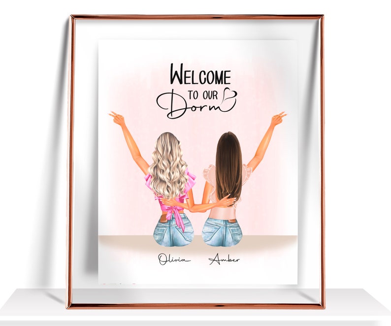 May include: A framed illustration of two women with long hair, wearing pink tops and denim shorts, with their arms around each other. The text "Welcome to our Dorm" is above them, and their names "Olivia" and "Amber" are below them.