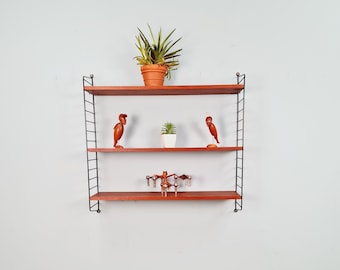 MCM Teak shelving system - consists of black lacquered metal ladders - WHB Germany