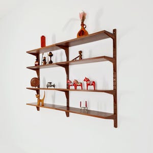 Midcentury Danish walnut Wall-Mounted Shelving Unit, by Poul Cadovius, 1960s