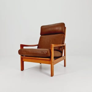 Mid Century Solid Teak & real Leather lounge chair/Easy chair By Niels Eilersen Illum Wikkelso, 1960s