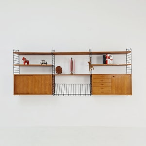 Wall-mounted original Swedish string shelf system, drawers, bookcase teak by Nils & Kajsa Strinning, 1960s