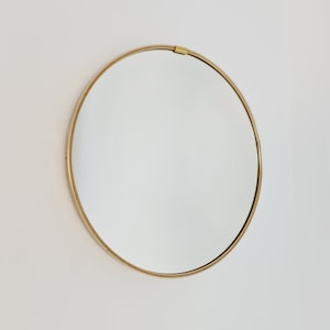 Mid-century round brass mirror from the 60s
