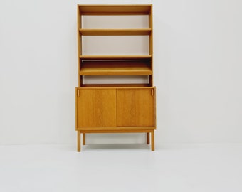 Swedish vintage book case with news Papper shelf oak by Fridhagen for Bodafors, 1960s