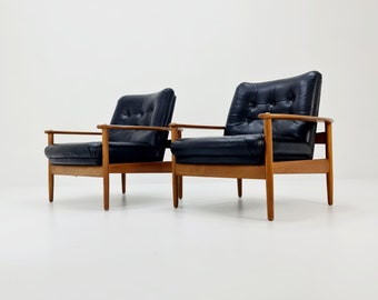 Mid-century pair of Danish lounge armchairs, Beech wood and leather 1960s