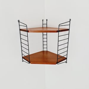 Original MCM Teak Corner shelving system - consists of Black lacquered metal ladders, from string Stockholm 1960s