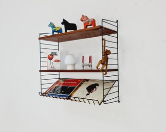 Original MCM Teak shelving system - consists of black lacquered metal ladders, from string Stockholm 1960s