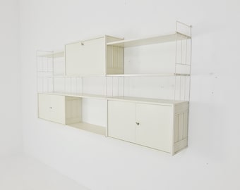 Wall-hanging String shelf system, bookcase with bar cabinet by WHB Germany, 1950s