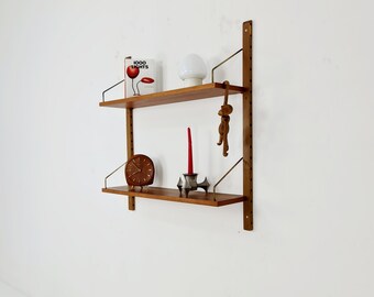 Midcentury Danish walnut wall-mounted shelving unit, by Royal for Poul Cadovius, 1960s
