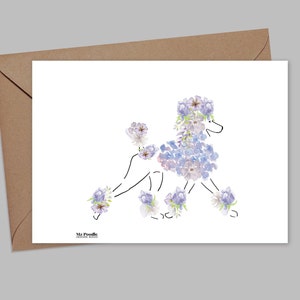 May include: A white card with a black line drawing of a poodle with purple and white flowers forming the outline of the dog. The text "Mz Poodle Designs" is at the bottom of the card.