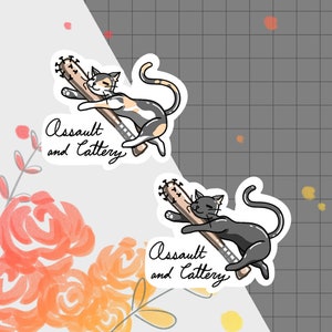 May include: Two stickers featuring a cartoon cat holding a baseball bat. The text on the stickers reads "Assault and Battery".