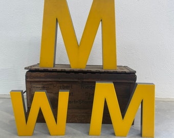 Vintage illuminated letter M W