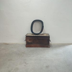Letra iluminada vintage O