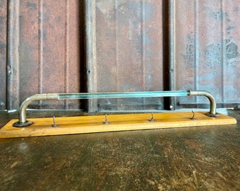 Vintage towel holder with glass rod