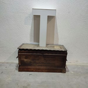 Letra T antigua