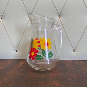 Vintage carafe with floral pattern
