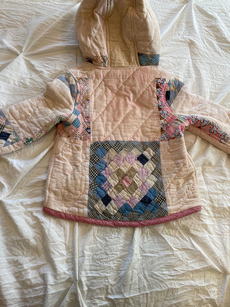 Pink quilted coat with sugarbead flowers main image 0