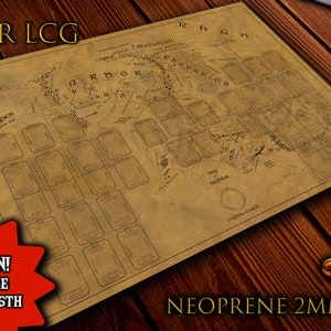 May include: A brown and beige map of Middle-earth with a grid of squares for game pieces. The map is printed on a brown background with the text "LOTR LCG" at the top. The text "NEW EDITION! AVAILABLE NOVEMBER 6TH 2022" is printed in red on a white starburst. The text "NEOPRENE 2MM" is printed in white on a brown background. A gold ring is in the lower right corner of the image.