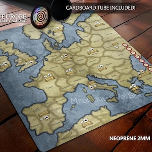 May include: A Risk Europe compatible game mat with a map of Europe, featuring country names and territories. The mat is made of neoprene and includes a cardboard tube for storage. The text "RISK EUROPE COMPATIBLE GAMEMAT" is visible.