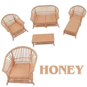May include: A miniature furniture set in a light tan color, featuring a sofa, two armchairs, a chaise lounge, and a rectangular coffee table, all crafted with a slatted design and solid cushions. The word HONEY is printed in large tan letters.
