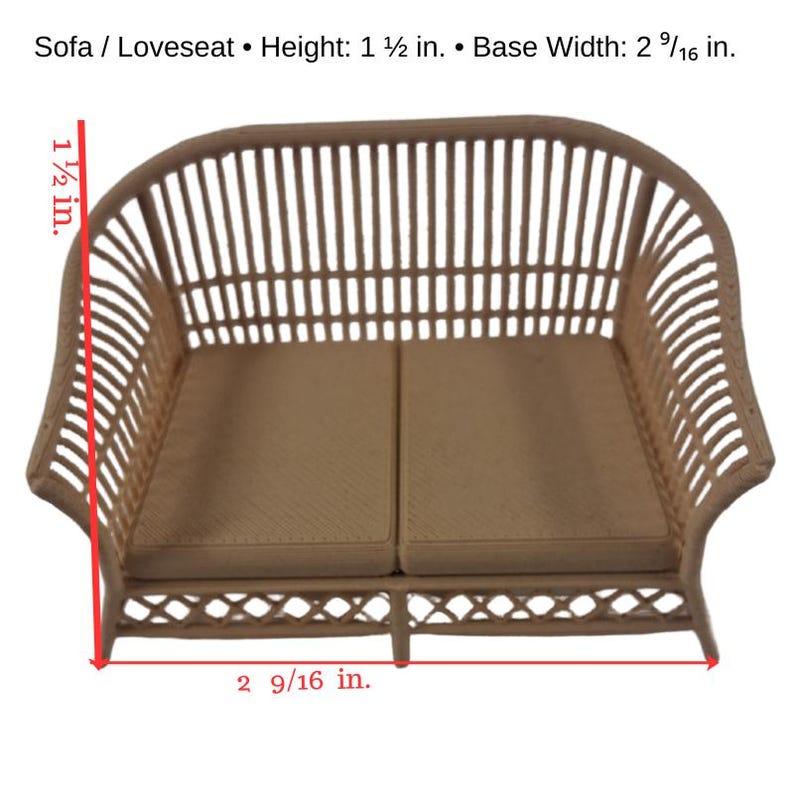 May include: A miniature beige sofa or loveseat with a slatted back and sides, featuring two flat seat cushions. Text indicates: Sofa / Loveseat &bull; Height: 1 1/2 in. &bull; Base Width: 2 9/16 in. The dimensions are visually marked with red lines.