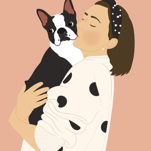 May include: A woman with brown hair wearing a white sweater with black polka dots and a black headband with white pearls is holding a black and white Boston Terrier dog and kissing it on the head.