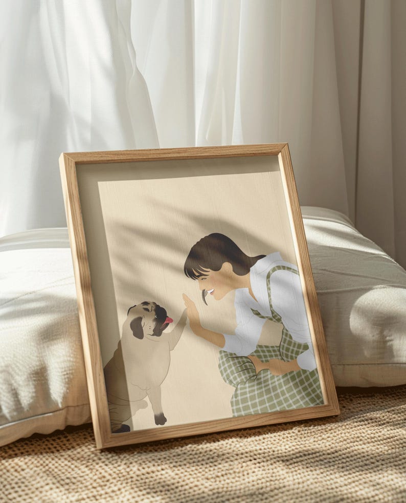 May include: A framed illustration of a person giving a high five to a pug dog. The illustration is in a minimalist style with a beige background and the person is wearing a white shirt and green plaid pants.