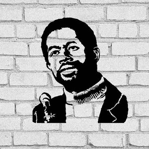 May include: Black and white stencil portrait of a man against a white brick wall. The man has a beard and is wearing a collared shirt and jacket. His index finger is pointing towards the viewer.