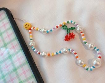 Typo - Create your own bracelet, keyring or phone charm! ✨🦋☮️ ​ ​What will  you be making first? ​ ​The DIY Charm Kits comes with: 50cm Clear beading  elastic, 75cm Black beading