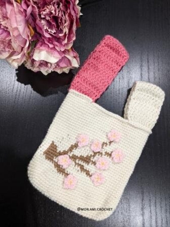 39 Cherry Blossom Crochet Patterns for Spring Decor, Gifts and Accessories 11 Sakura (Cherry Blossom) Knot Bag Crochet