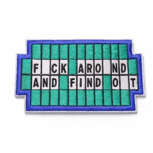May include: Embroidered patch with the phrase "F*ck Around and Find Out" in a game show-style design. The patch features a blue border, green and white squares, and black lettering. A humorous accessory.
