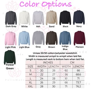 May include: A chart showing the color options and size chart for a unisex 50/50 cotton/polyester sweatshirt. The colors include dark gray, white, ash, sand, black, navy, light pink, light blue, gray, brown, indigo blue, maroon, and forest green. The size chart shows the width and length measurements in inches and centimeters for sizes S, M, L, XL, and XXL.
