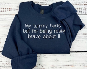Funny Embroidered ‘My Tummy Hurts’ Cozy Crewneck Sweatshirt.