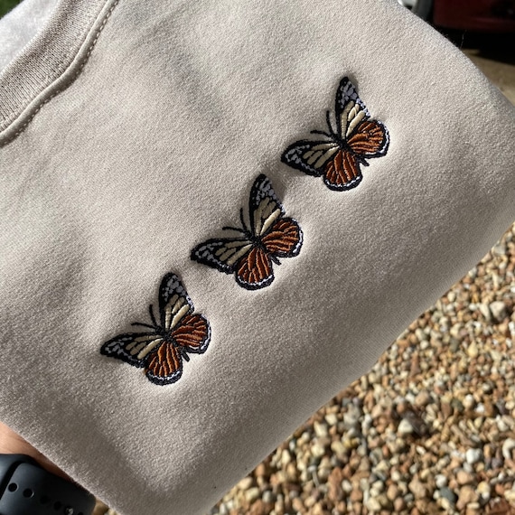 Butterfly embroidered sweatshirt deals