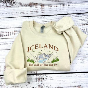Bluza z haftem Islandia: prezent podróżny z Krainy Ognia i Lodu