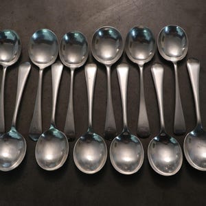 Antique soup/desert spoons set of 12 silver plated