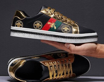 gucci shoes black and gold