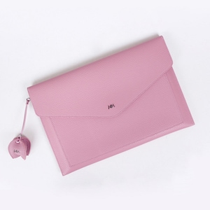 May include: A pink leather envelope clutch with a silver zipper and a small pink leather flower charm. The clutch has the initials "MM" embossed on the front.