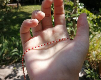 White red and gold necklace in rockery beads