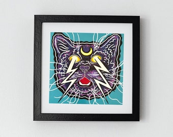 May include: A framed print of a black cat with a crescent moon above its head and lightning bolts coming from its eyes. The cat's fur is a dark purple with a starry pattern. The background is a teal blue.