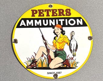 Letrero de porcelana vintage de 12” de Peters Ammunition para caza, pesca y juegos de armas, para autos, camiones, motocicletas, camiones y vehículos.