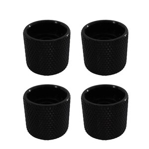 May include: A set of four cylindrical black knobs featuring a textured, diamond-patterned knurled surface. Each knob has a hollow center and a smooth, circular top rim, designed for use as a control component on electronic equipment or machinery.