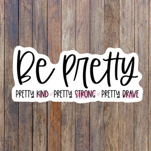 May include: White sticker with black text that reads "Be Pretty" and "Pretty Kind, Pretty Strong, Pretty Brave".